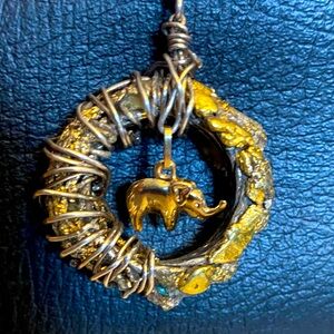 Gold Nugget Ekephant pendant on Sterling Silver Necklace